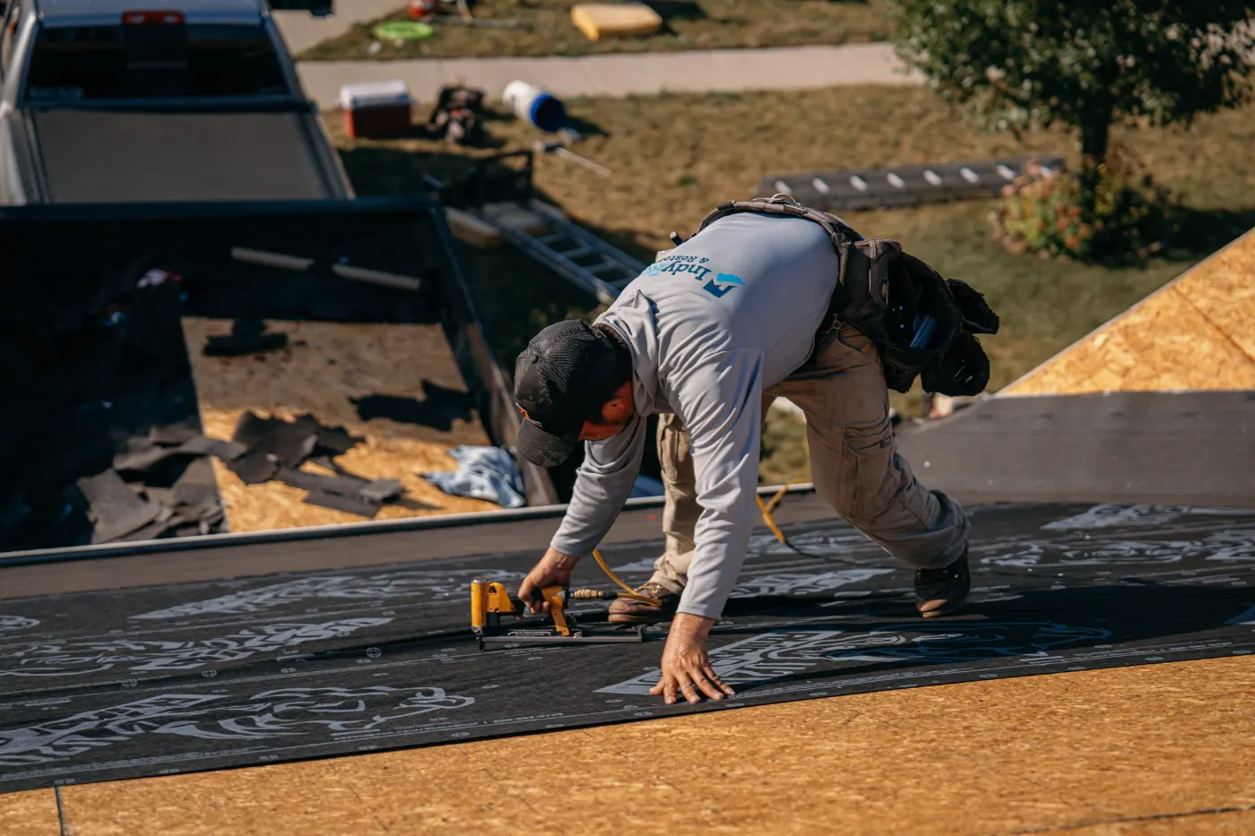 Tarping and dry-in on a Olive Branch Manor commercial roof
